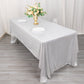 Shiny silver polyester tablecloth with shimmer sequin dots on a dining table.