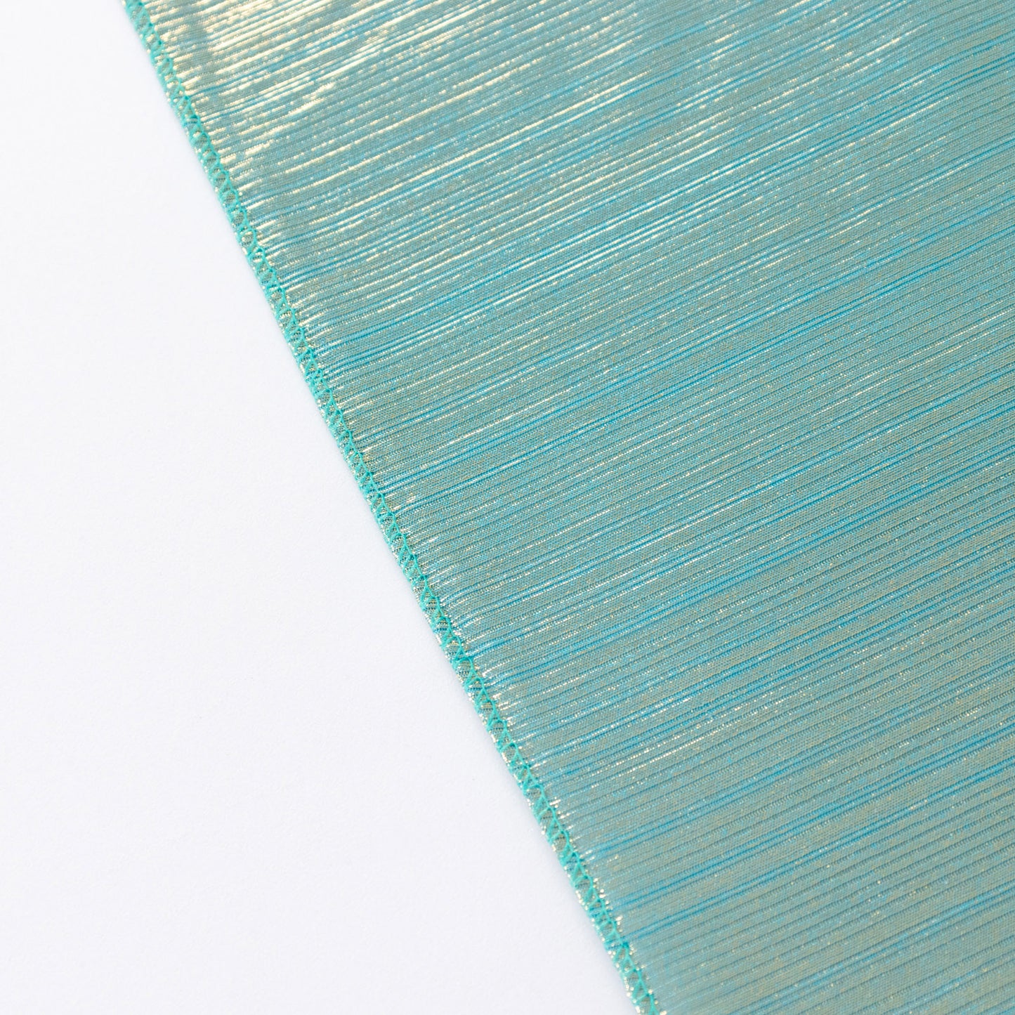 Shiny turquoise rectangular tablecloth with shimmer sequin dots.