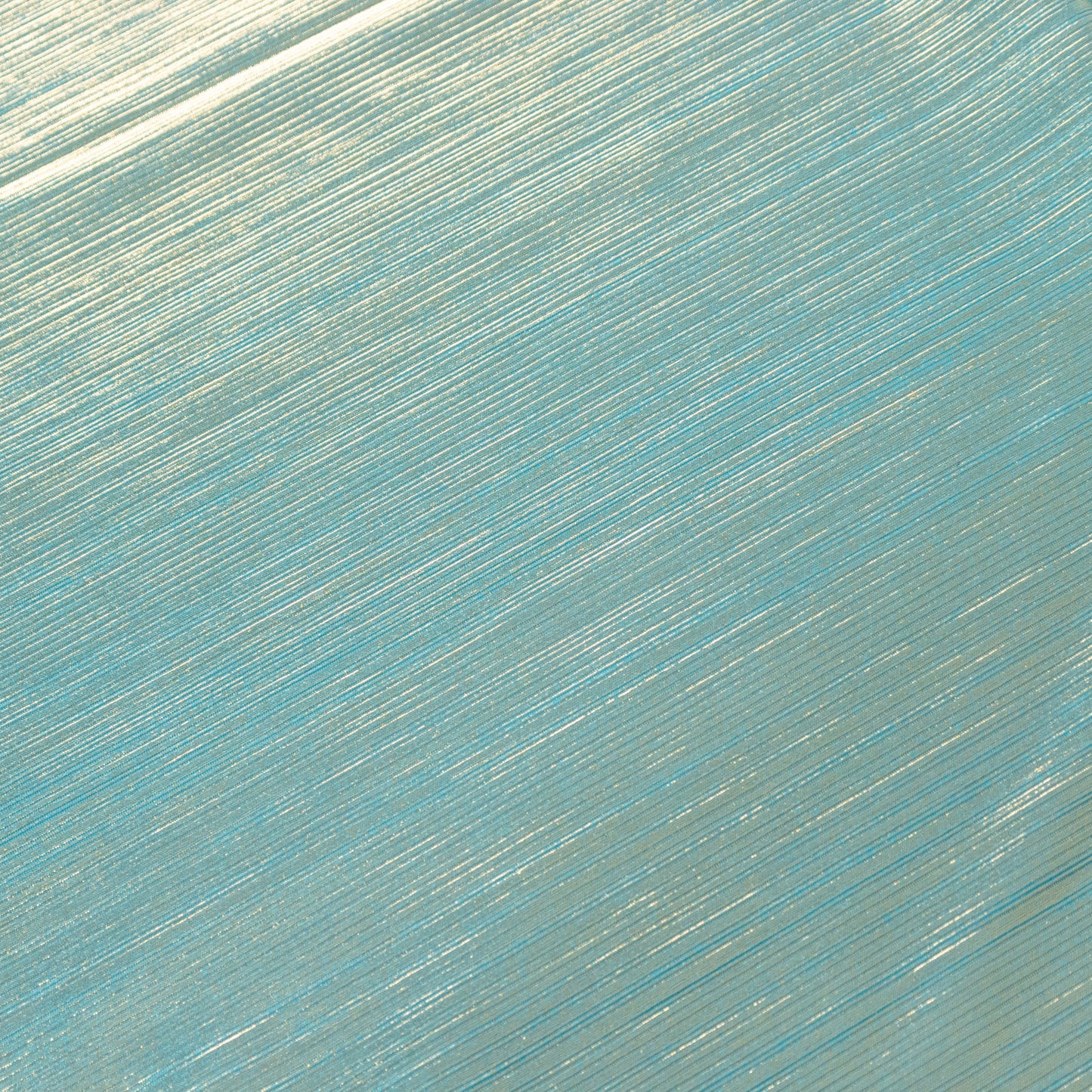 Shiny turquoise rectangular tablecloth with shimmer sequin dots.