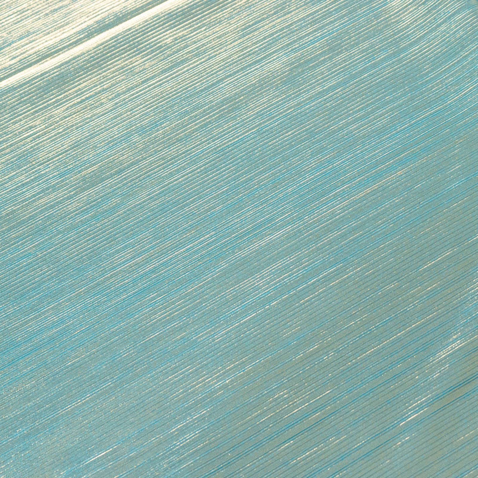 Shiny turquoise rectangular tablecloth with shimmer sequin dots.