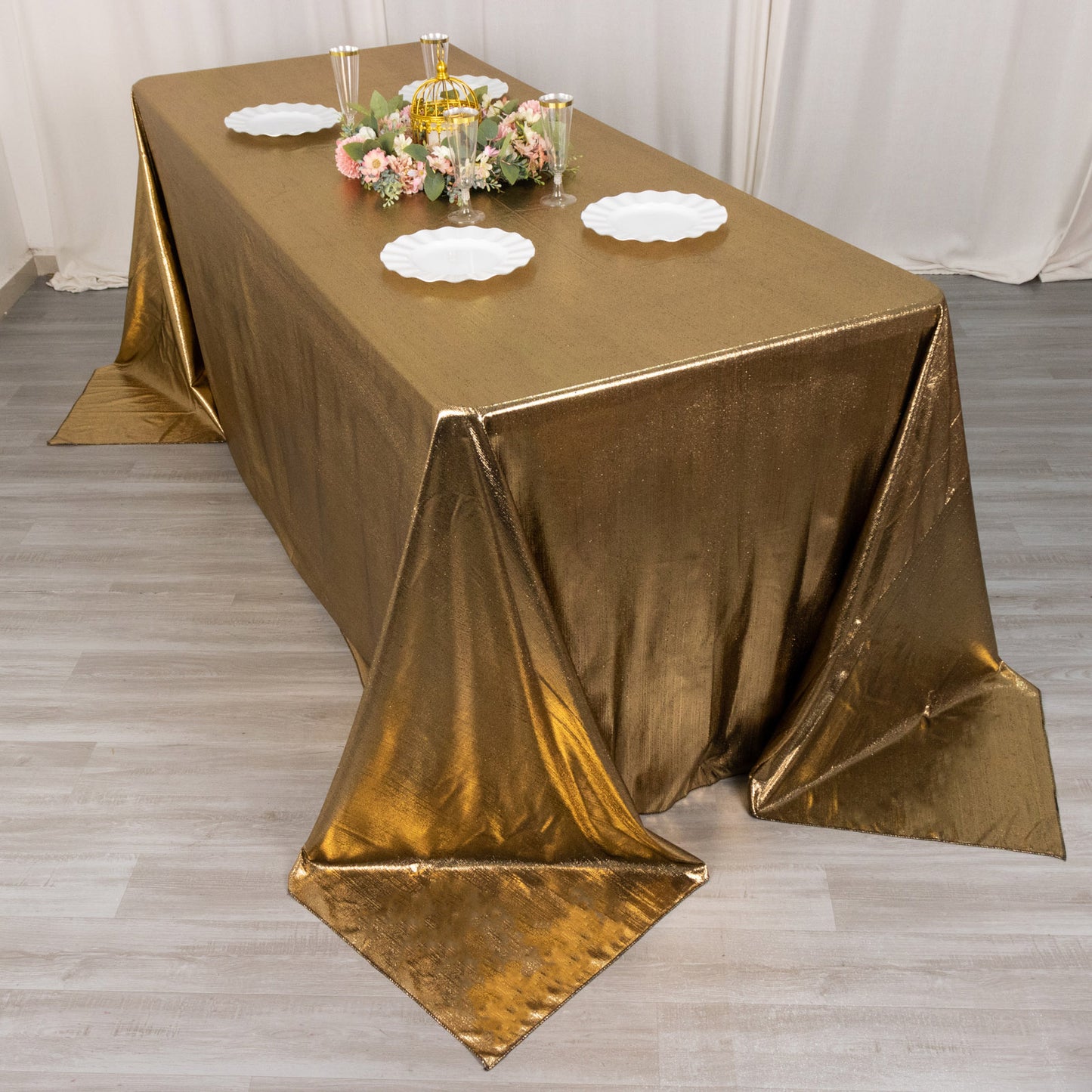 Antique gold shimmer sequin dots tablecloth for elegant events.