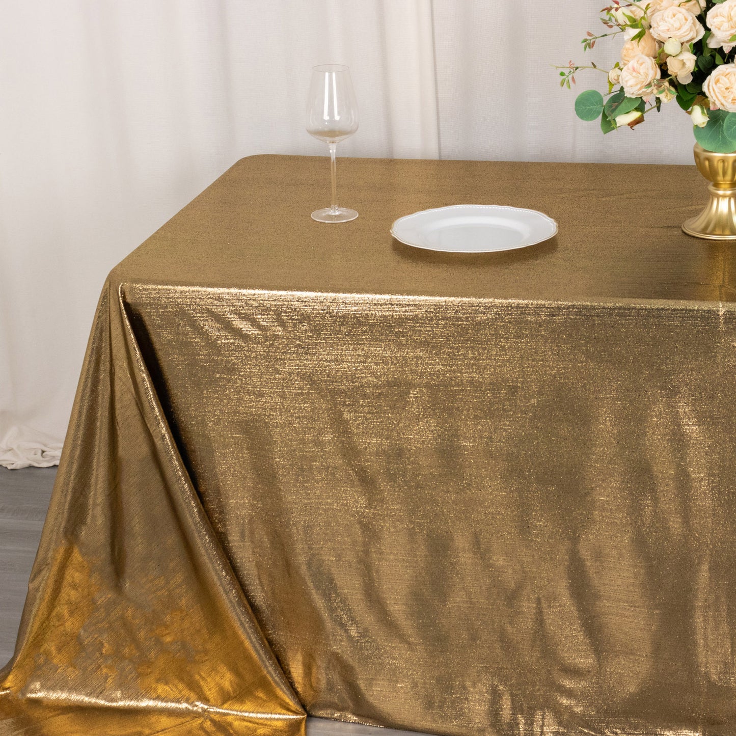 Antique gold shimmer sequin tablecloth, wrinkle-free sparkle cover.
