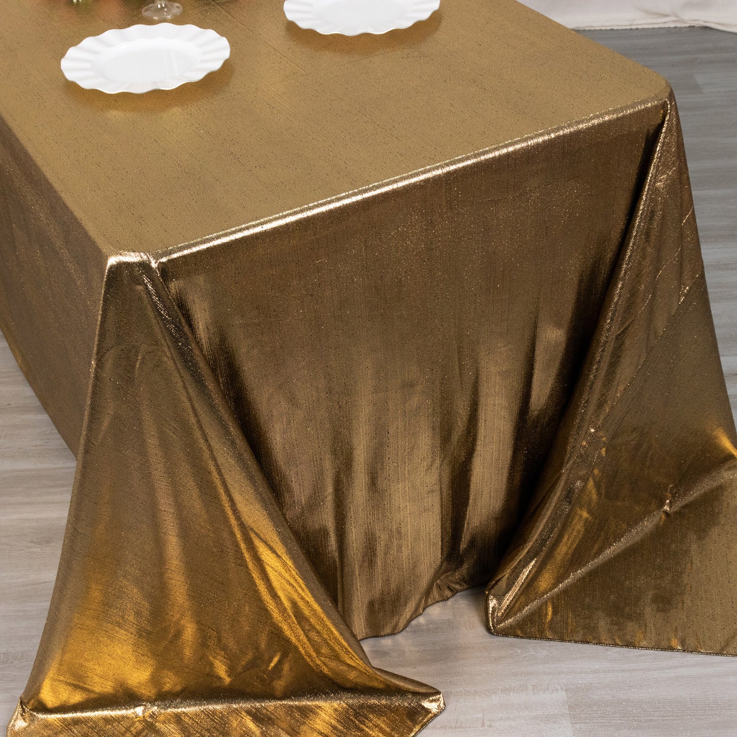 Antique gold shimmer sequin tablecloth on a dining table.