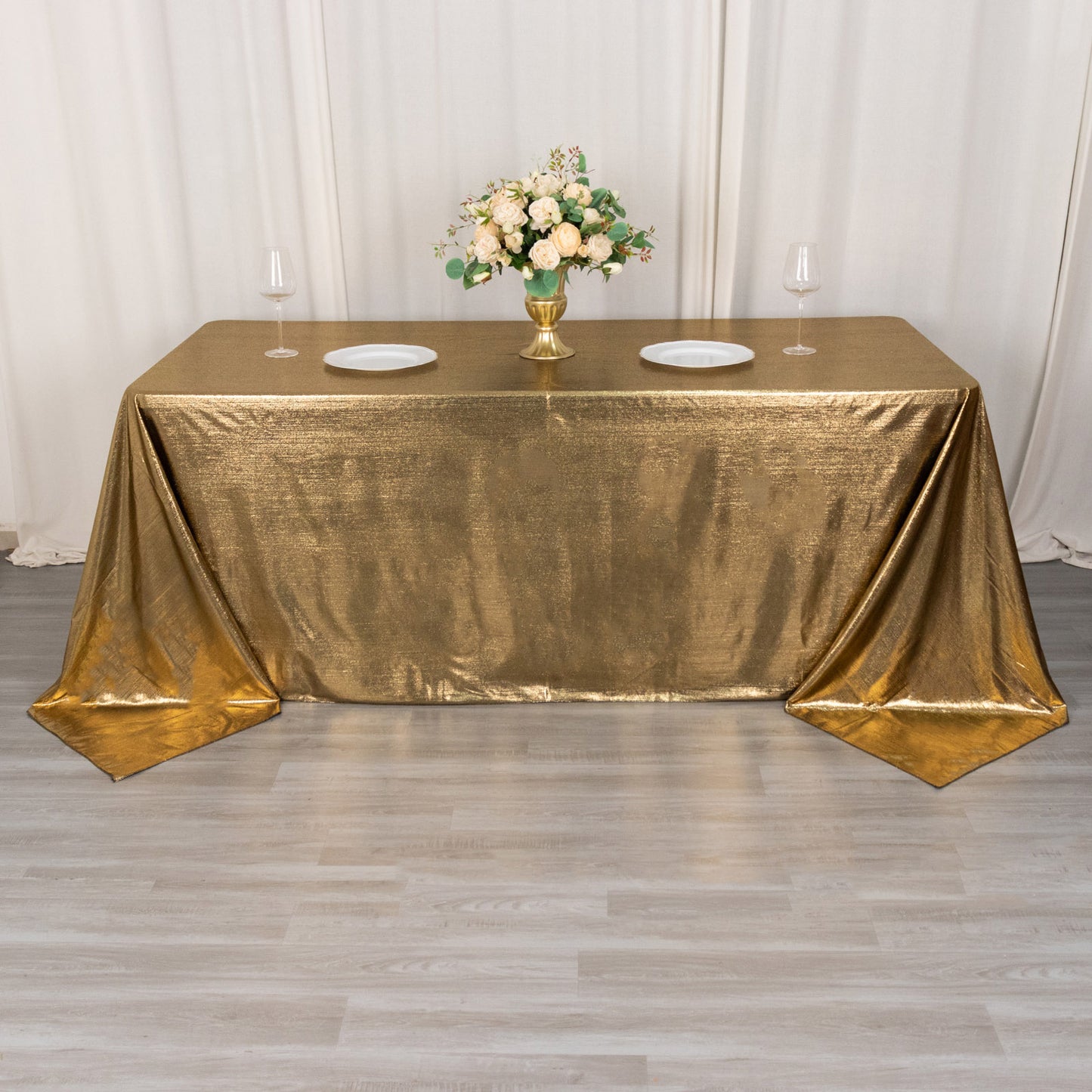 Antique gold shimmer sequin tablecloth on a dining table