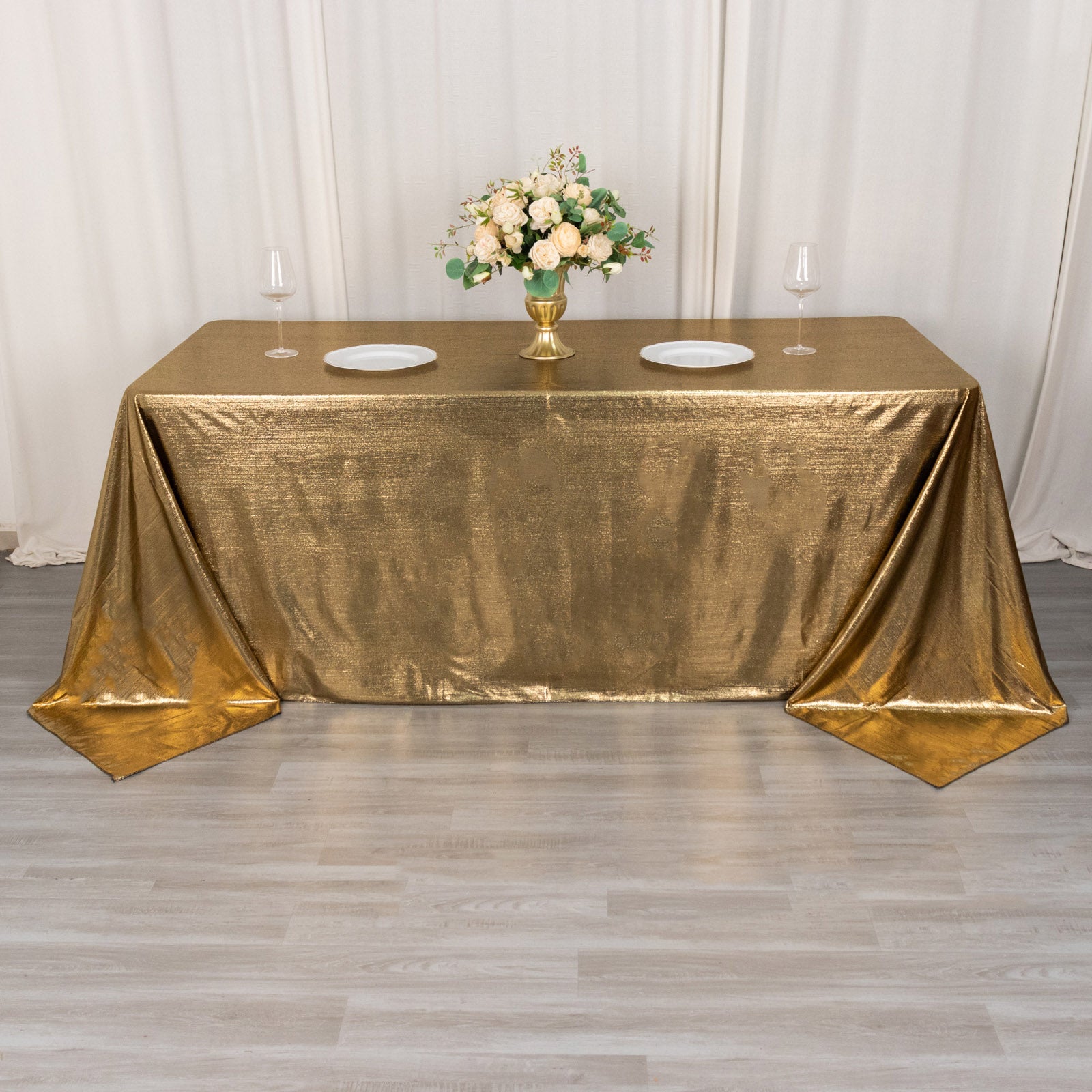 Antique gold shimmer sequin tablecloth on a dining table
