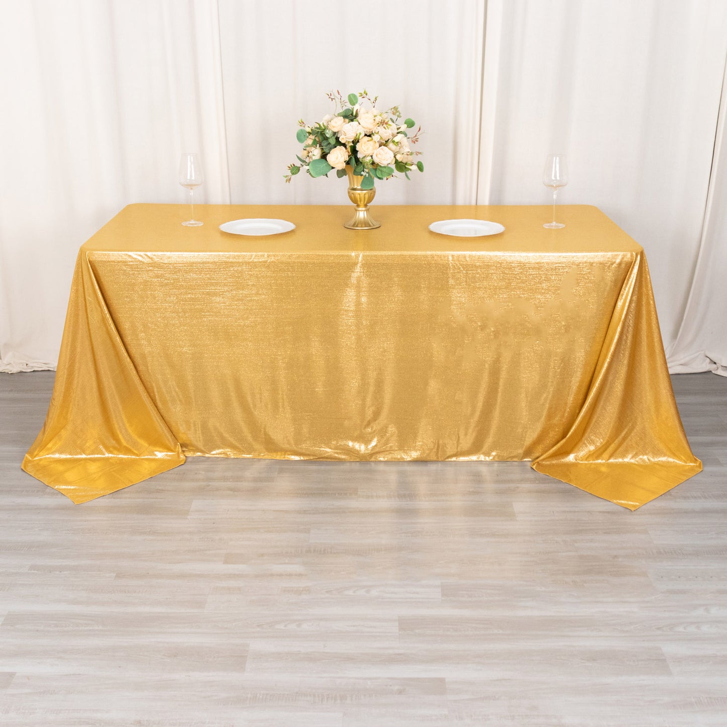 Gold shimmer sequin tablecloth with a sparkling finish for elegant events.
