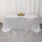 Silver shimmer sequin tablecloth on a decorated table.