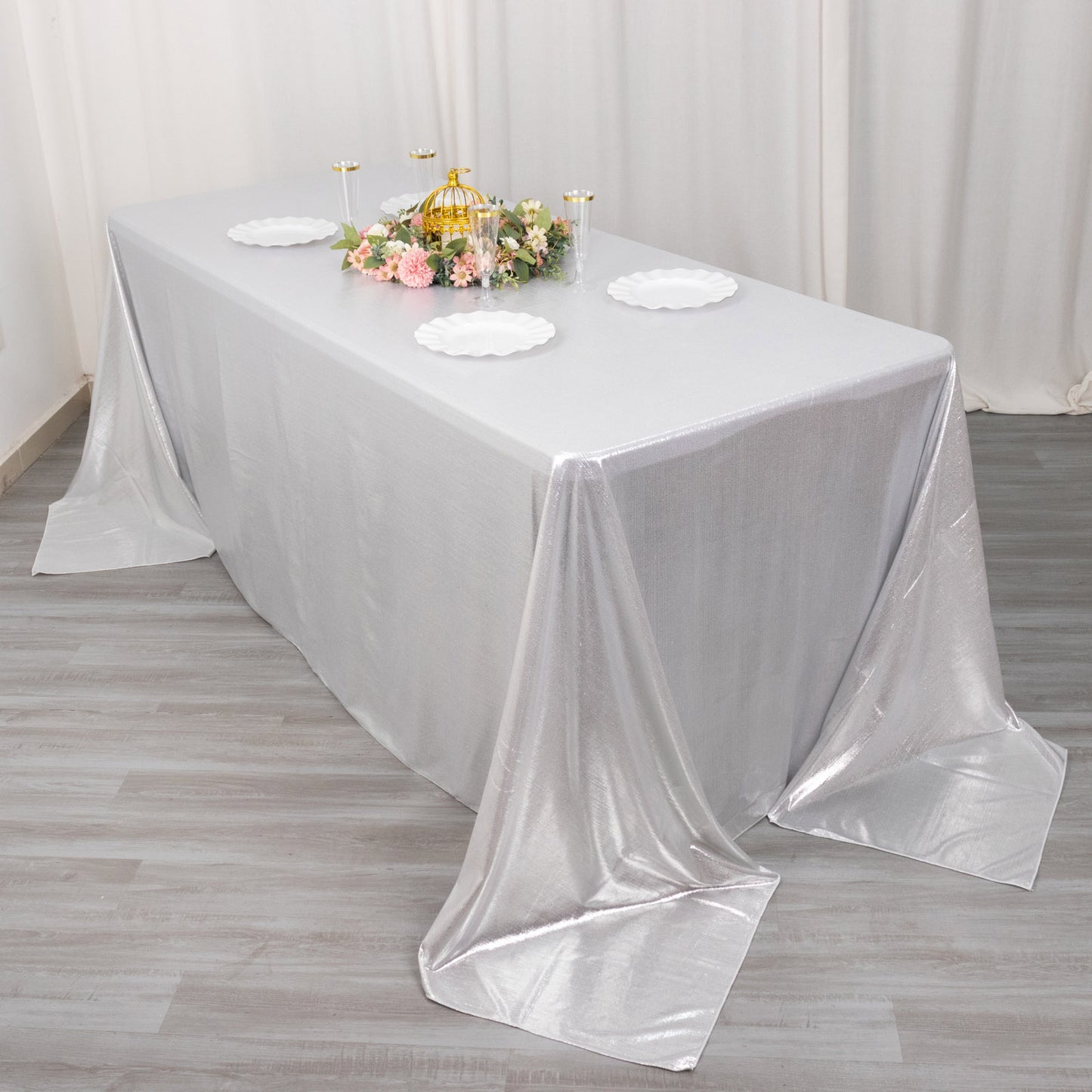Silver shimmer sequin dots tablecloth on a banquet table.