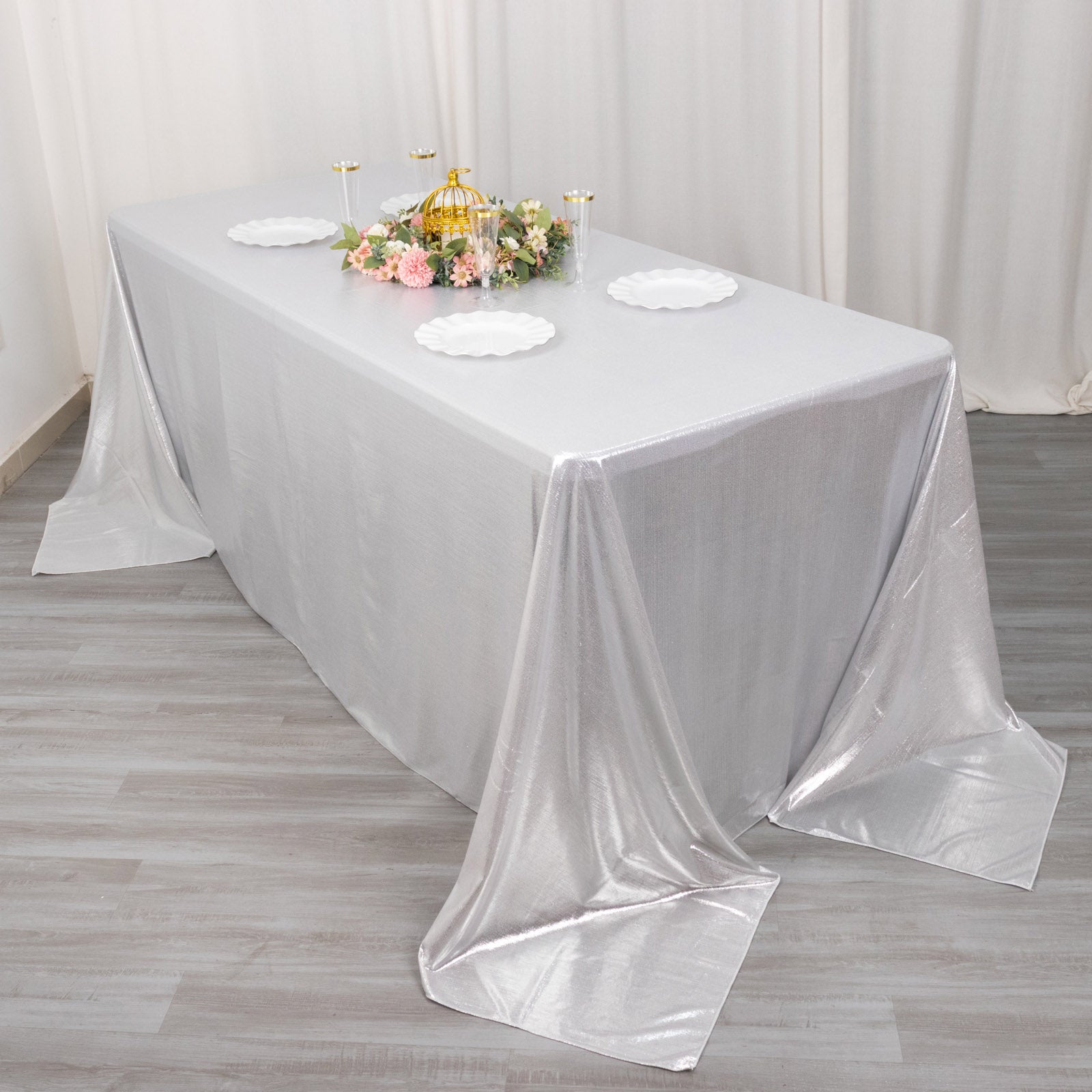 Silver shimmer sequin dots tablecloth on a banquet table.