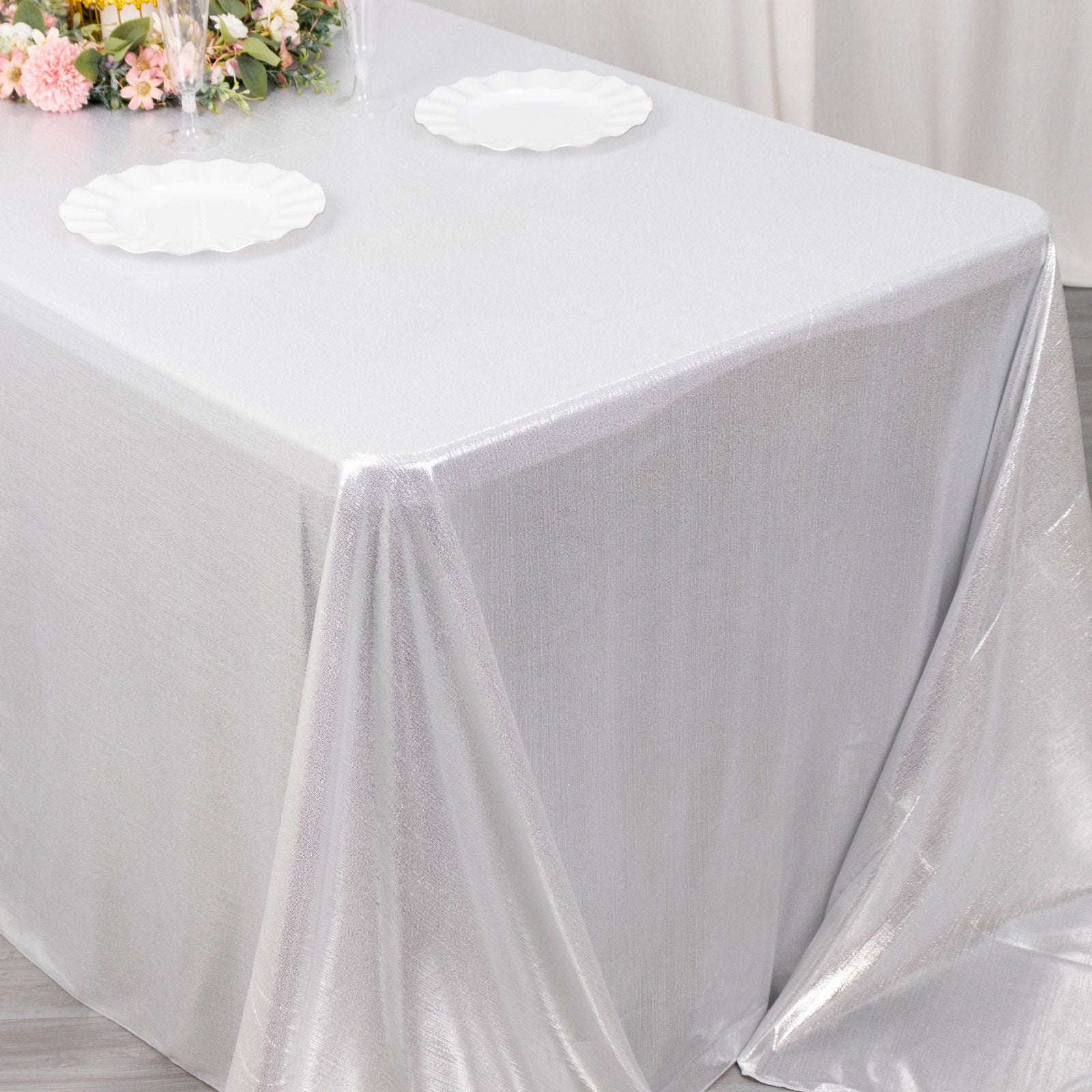 Silver shimmer sequin dots tablecloth on a dining table.