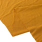 Gold stretchy tablecloth with ruffles for 60-inch tables.