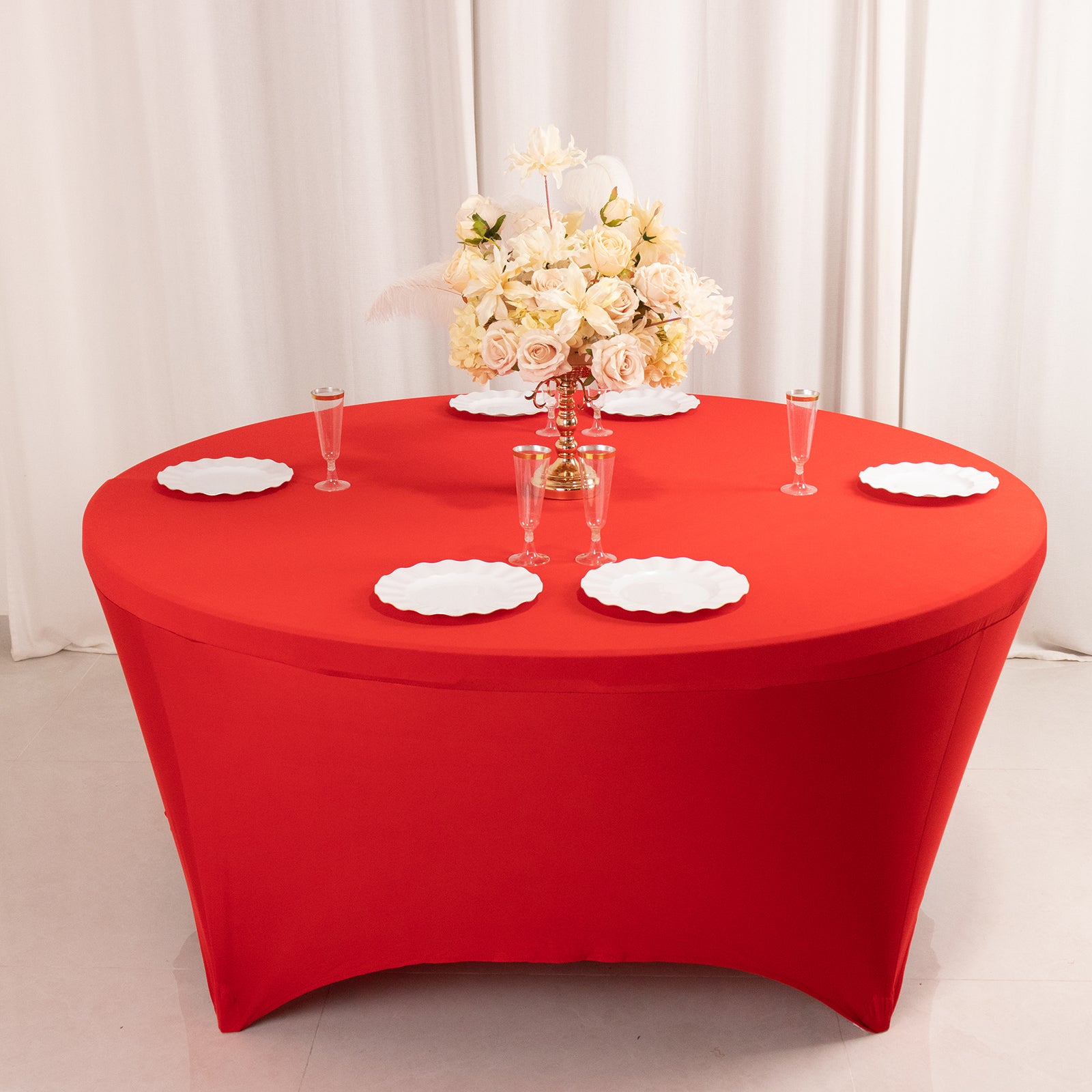 Red round fitted spandex tablecloth for 72-inch tables.