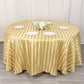Champagne satin stripe round tablecloth on a dining table.