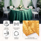 Dusty rose satin stripe round tablecloth on a green table.