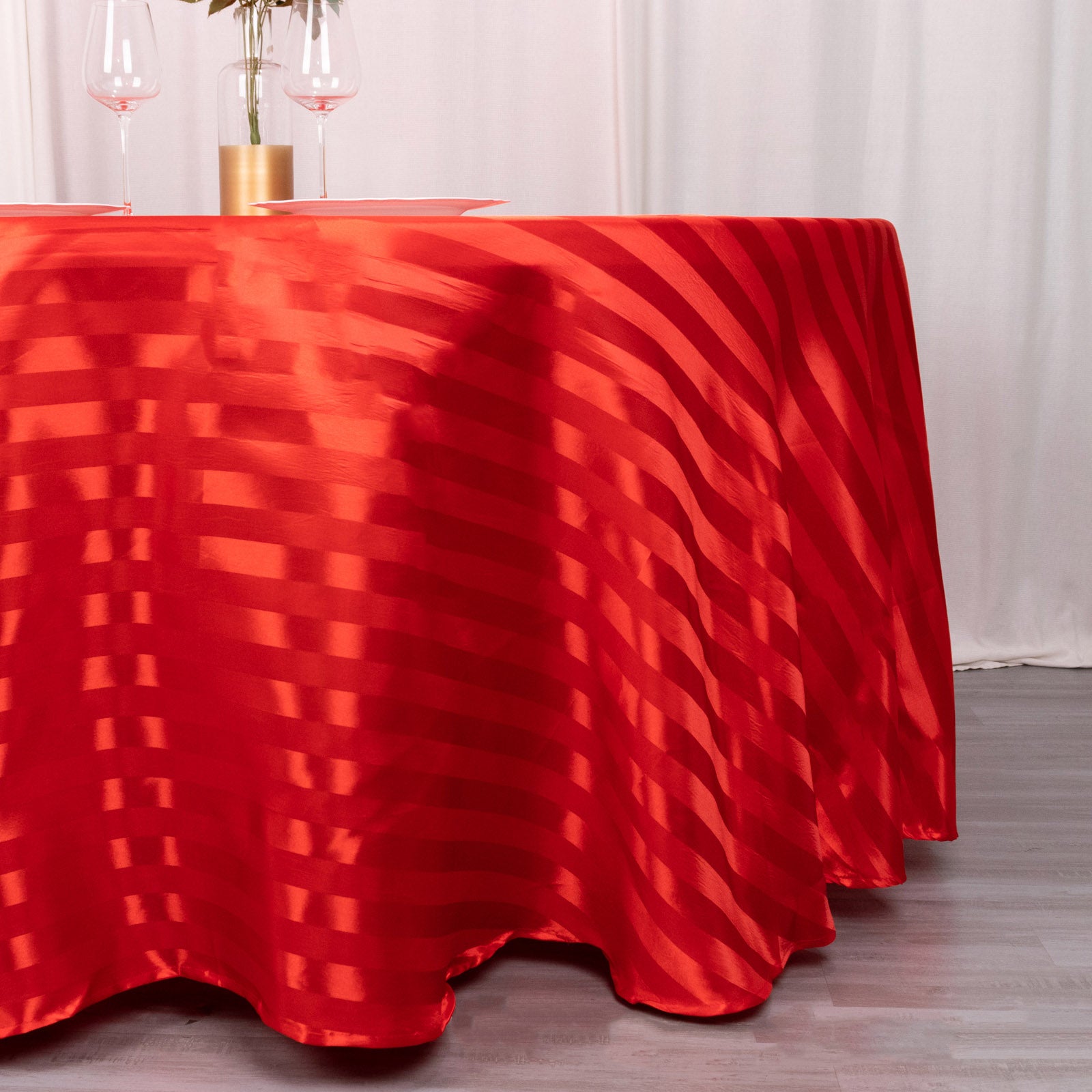 Red satin stripe round tablecloth.