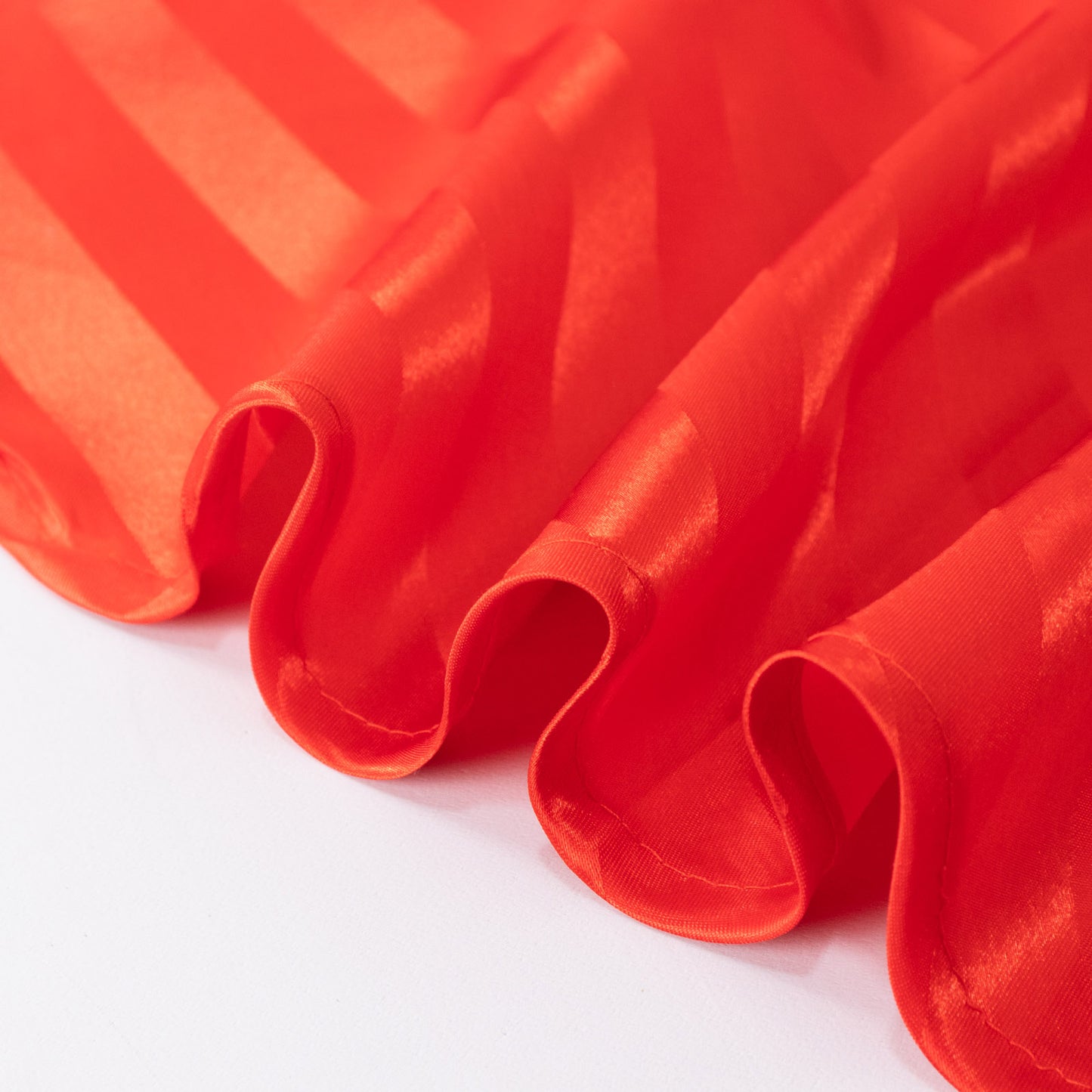 Red satin stripe seamless round tablecloth.