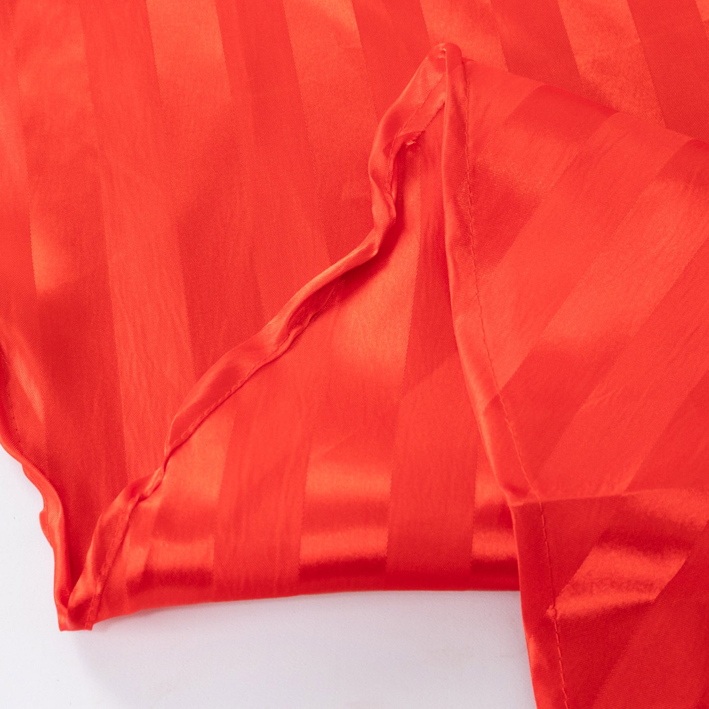 Red satin stripe tablecloth, 90"x132", seamless rectangular design.