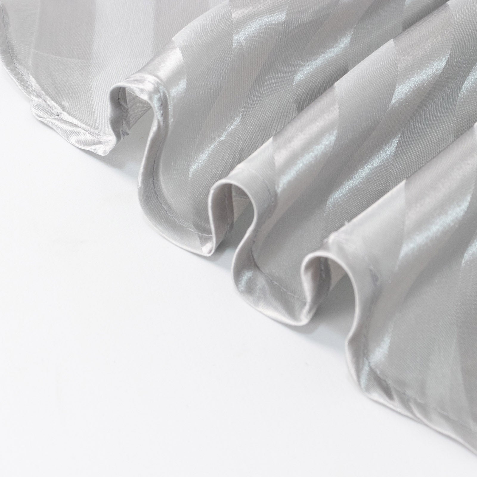Silver satin stripe tablecloth, 90"x132", seamless rectangular design.