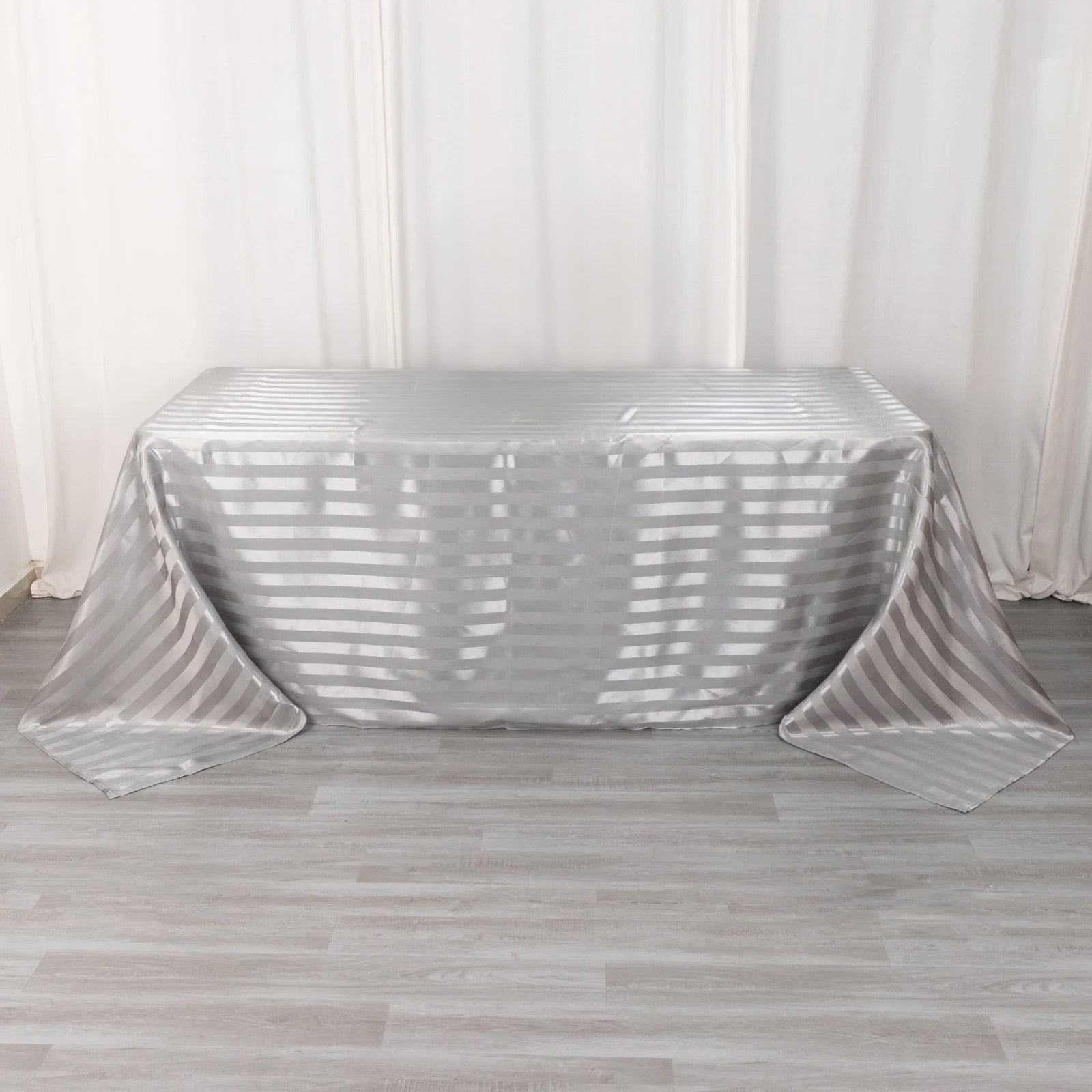 Silver satin stripe tablecloth, 90"x132", seamless rectangular design.