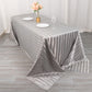 Silver satin stripe tablecloth on a rectangular table.
