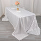 White satin stripe rectangular tablecloth on a dining table.