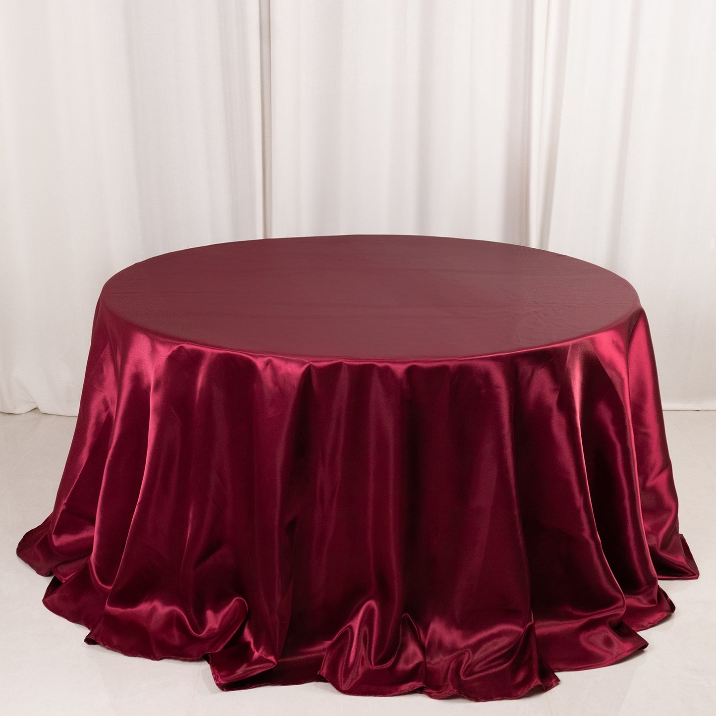 132" Burgundy Seamless Satin Round Tablecloth for 6 Foot Table With Floor-Length Drop