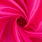 Fuchsia satin round tablecloth for 6 foot table with floor-length drop.