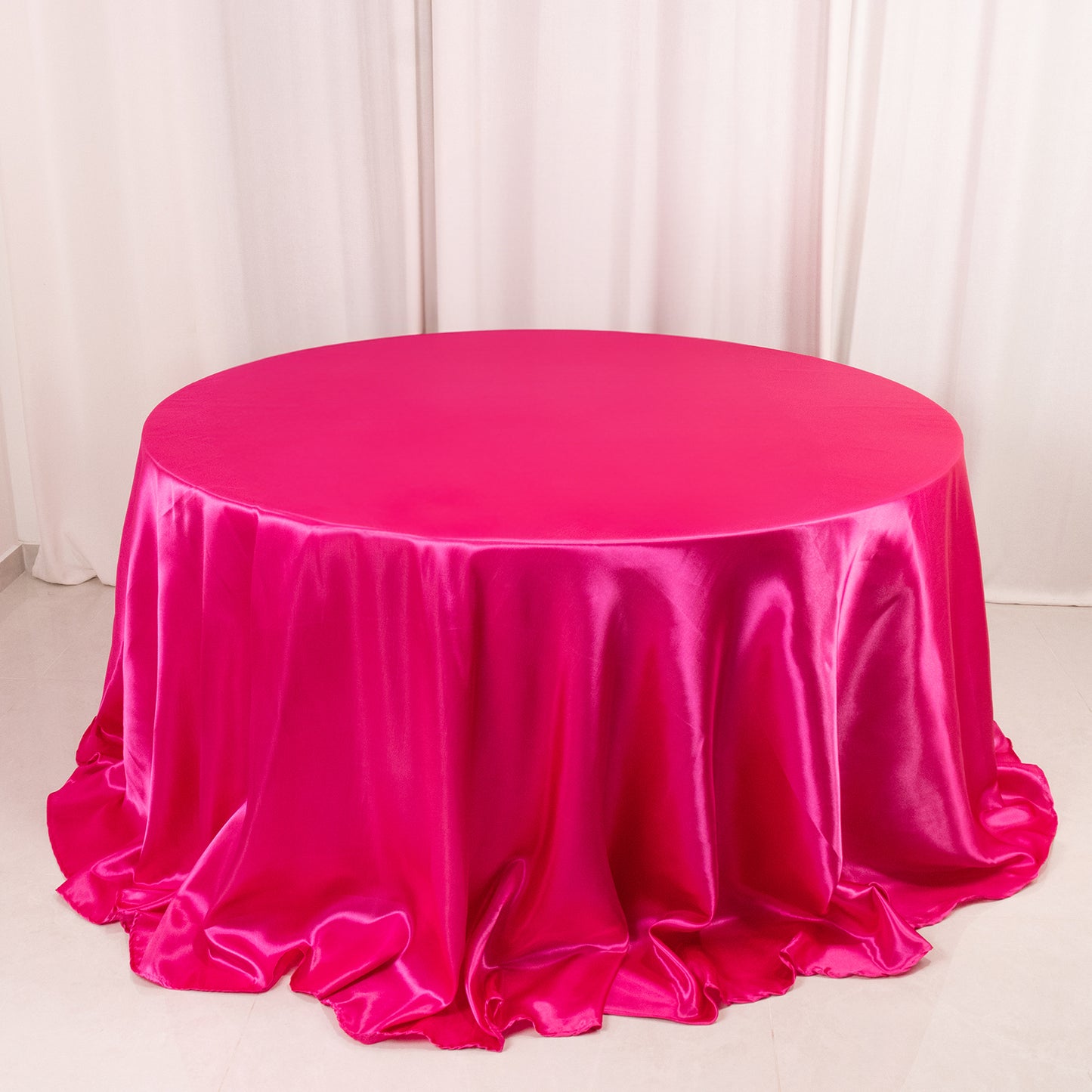 132" Fuchsia Seamless Satin Round Tablecloth for 6 Foot Table With Floor-Length Drop