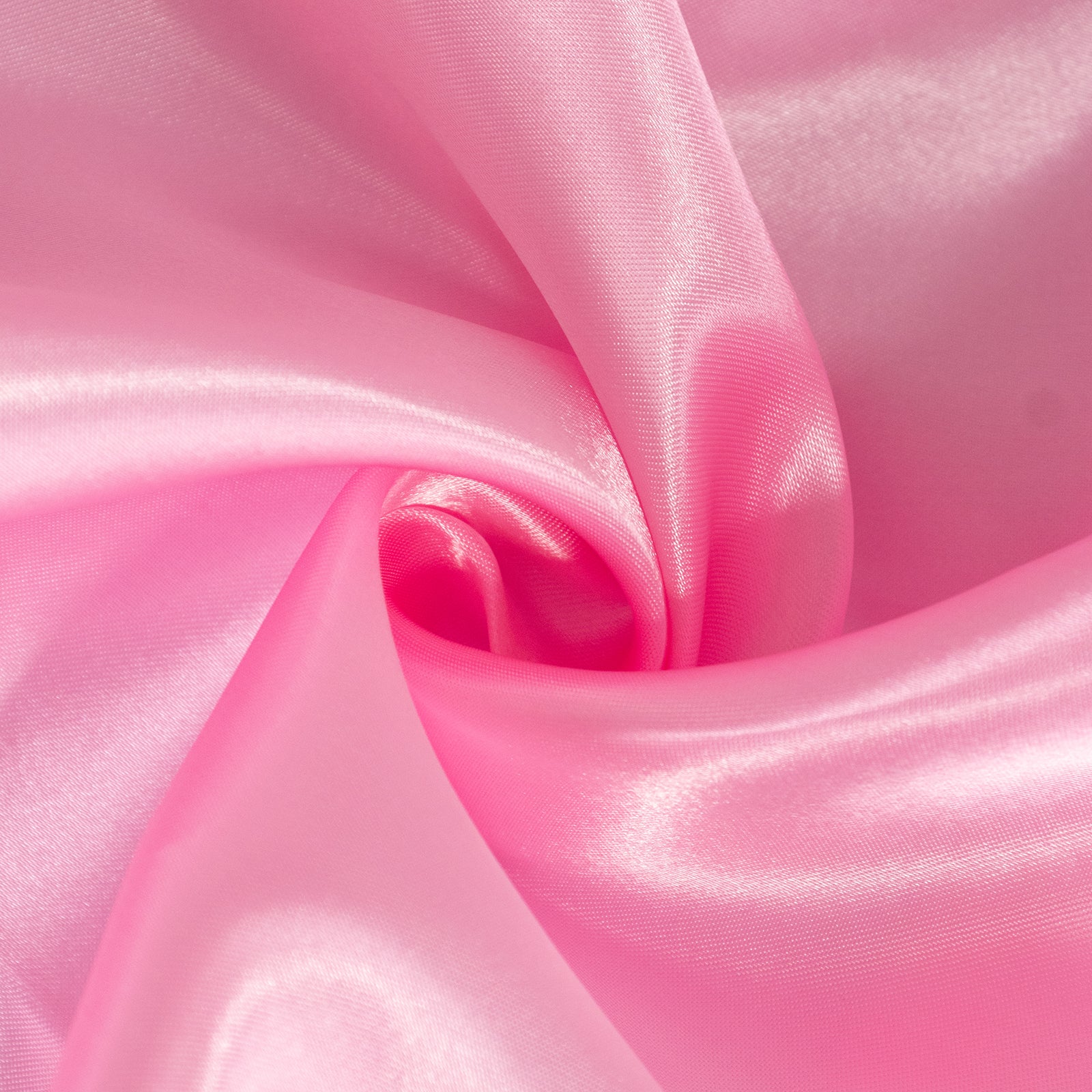 Pink satin round tablecloth for 6 foot table with floor-length drop.