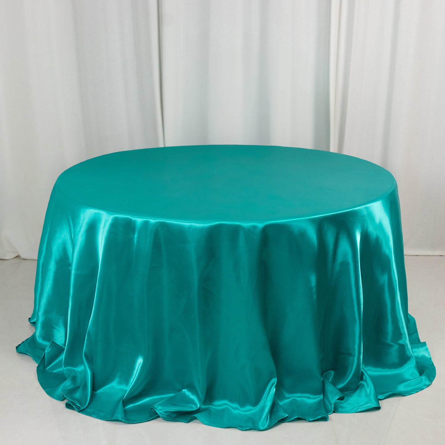 132" Turquoise Seamless Satin Round Tablecloth for 6 Foot Table With Floor-Length Drop