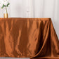 Cinnamon brown satin rectangular tablecloth on a table.