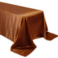 Cinnamon brown satin rectangular tablecloth on a table.