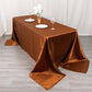 Cinnamon brown satin rectangular tablecloth on a dining table.