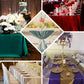 Cinnamon brown satin rectangular tablecloth on elegantly set tables.
