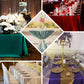 Terracotta satin rectangular tablecloth on elegant dining setup.