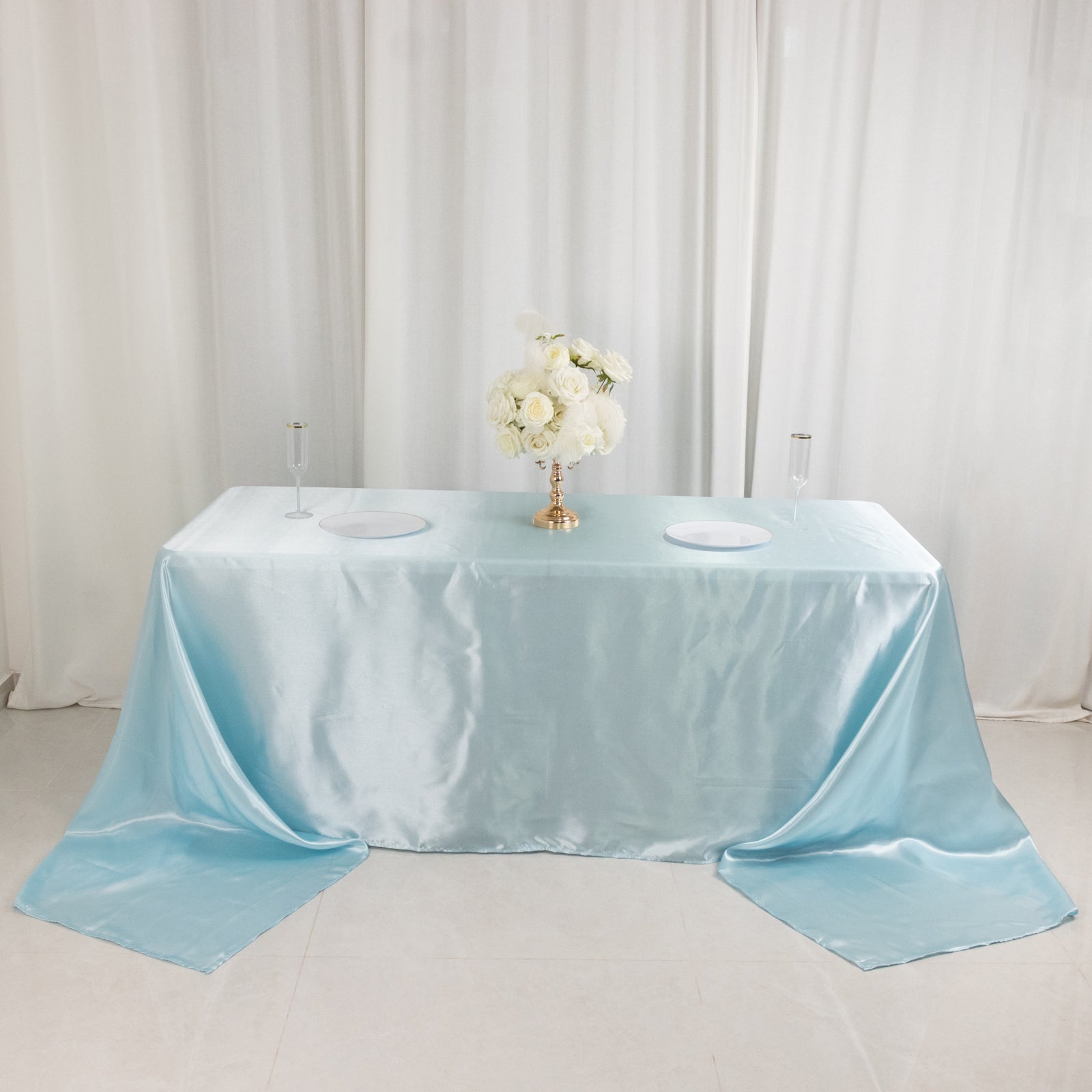 Light blue satin tablecloth for 8-foot table with floor-length drop.