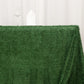 Green fringe shag polyester rectangular tablecloth on a table.