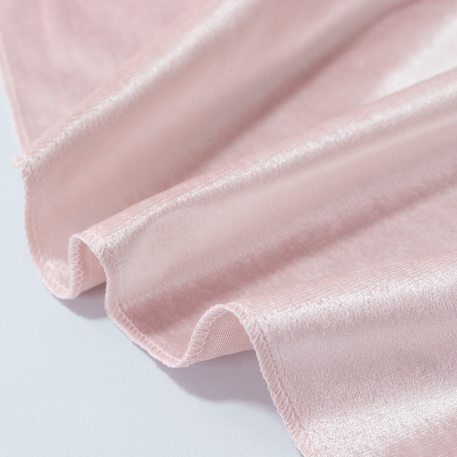 Blush velvet round tablecloth, soft and reusable.