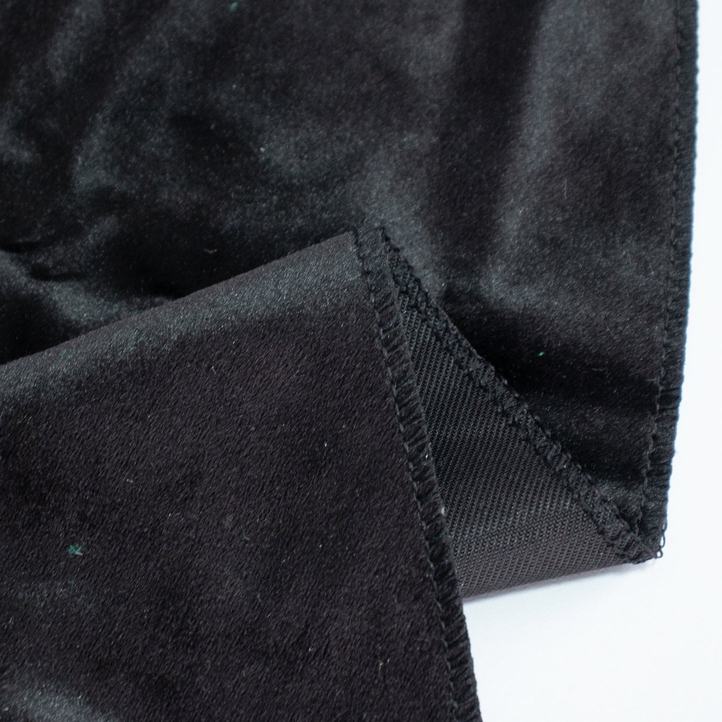 Premium black velvet round tablecloth, seamless and reusable.