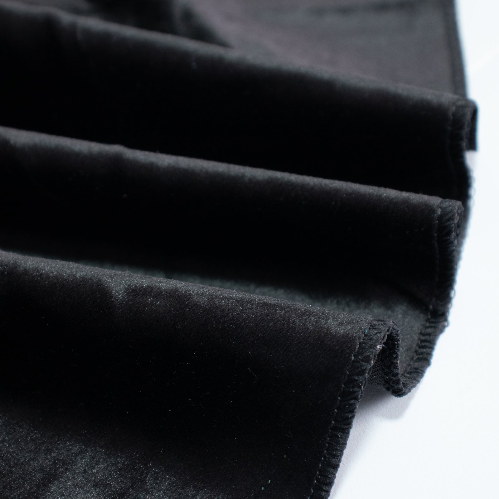 Premium black velvet round tablecloth, soft and seamless fabric.