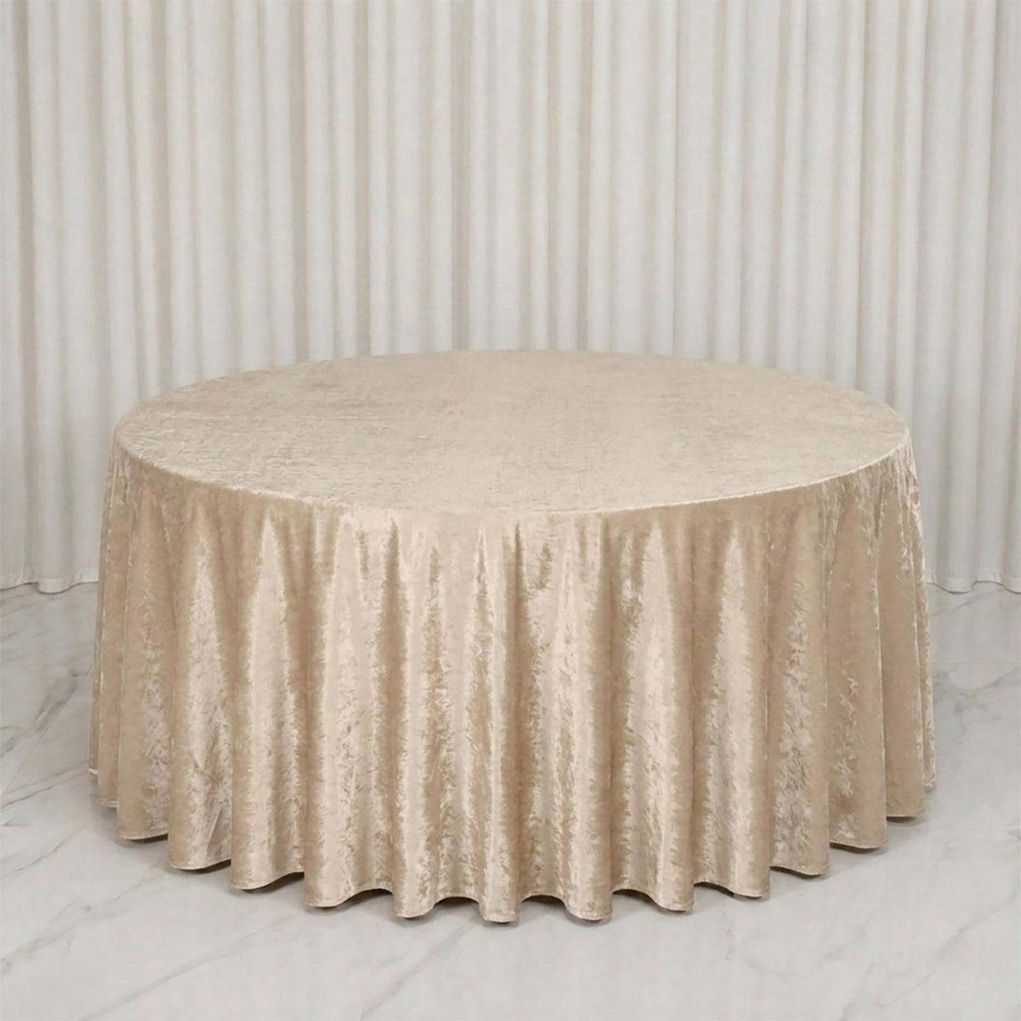 Champagne 132" round velvet tablecloth, soft and seamless.