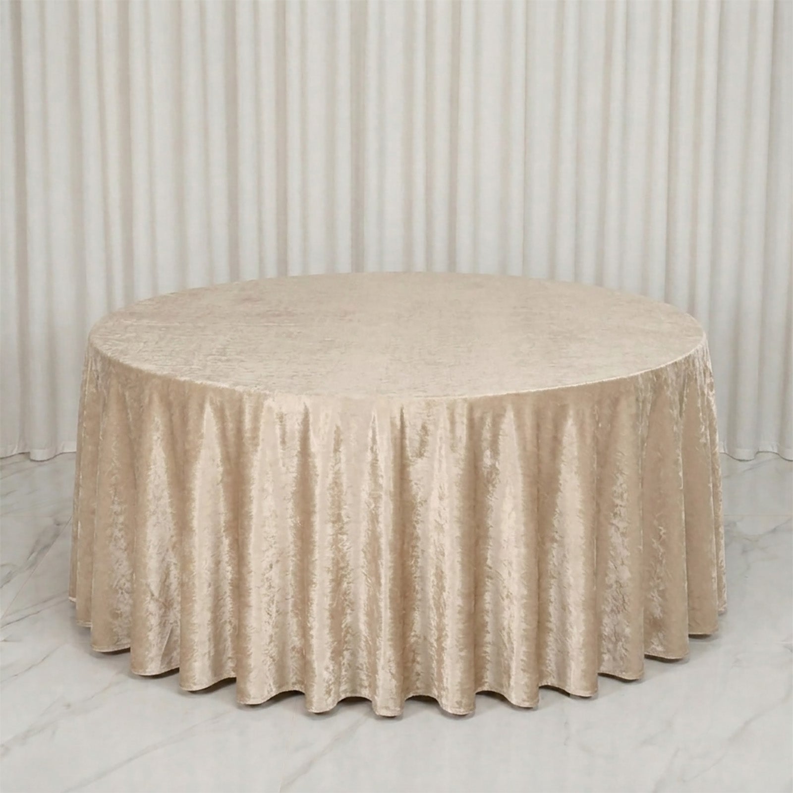 Champagne 132" round velvet tablecloth, soft and seamless.
