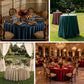 Round velvet table covers styled with floral centerpieces and candlelit event décor