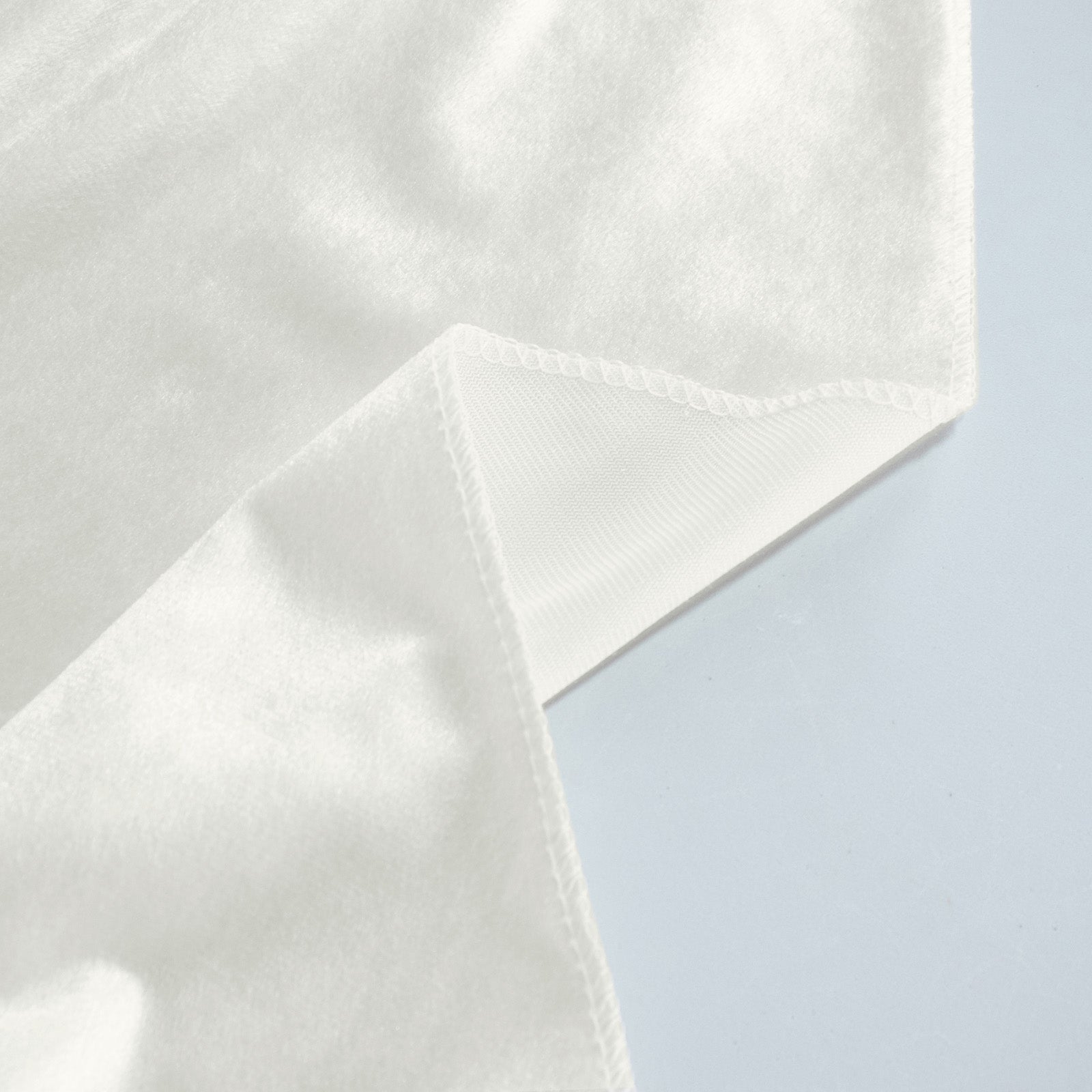 Ivory premium velvet round tablecloth, soft and seamless design.