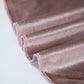 Mauve velvet round tablecloth, soft and seamless design.