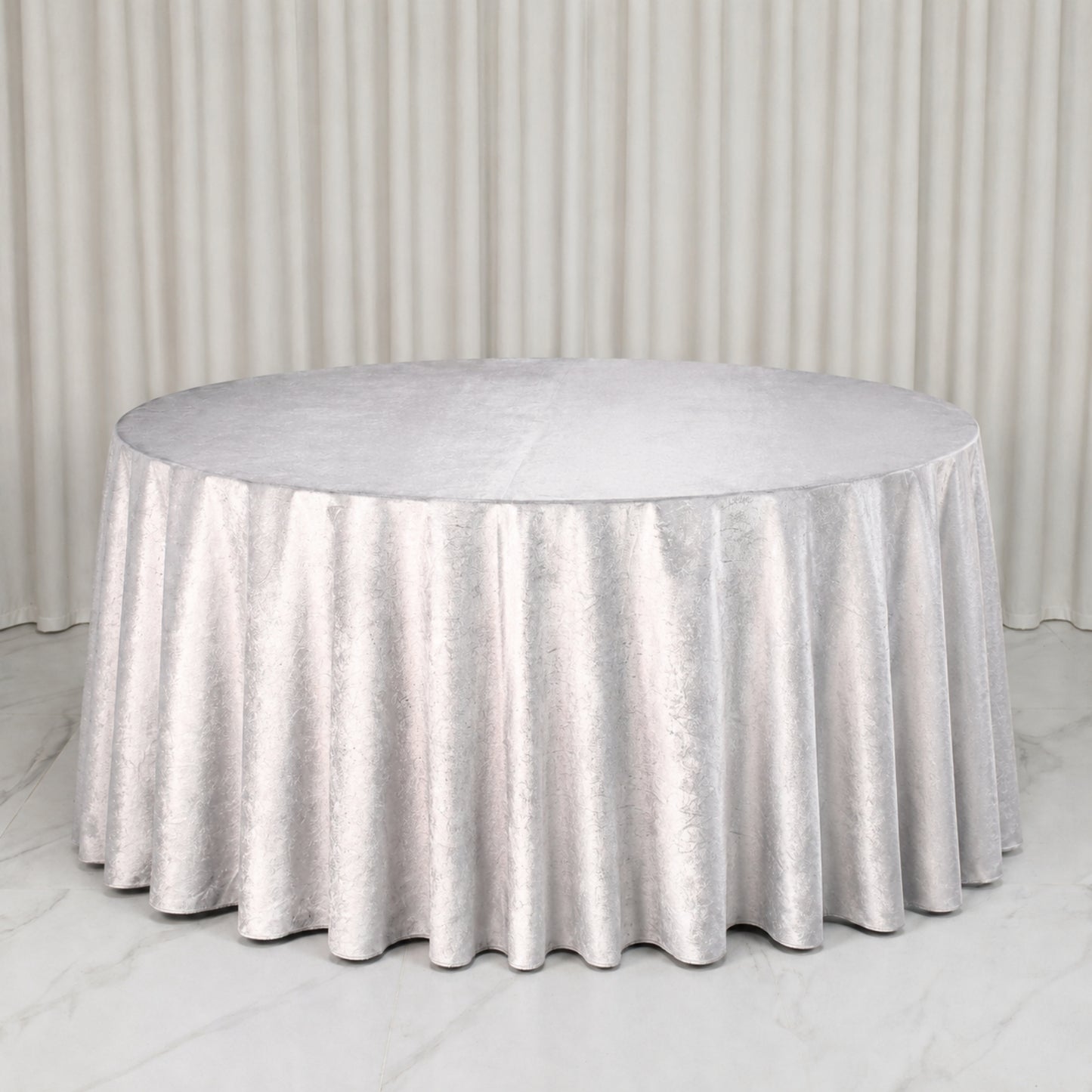 Premium silver velvet round tablecloth, soft and seamless, perfect for any occasion.