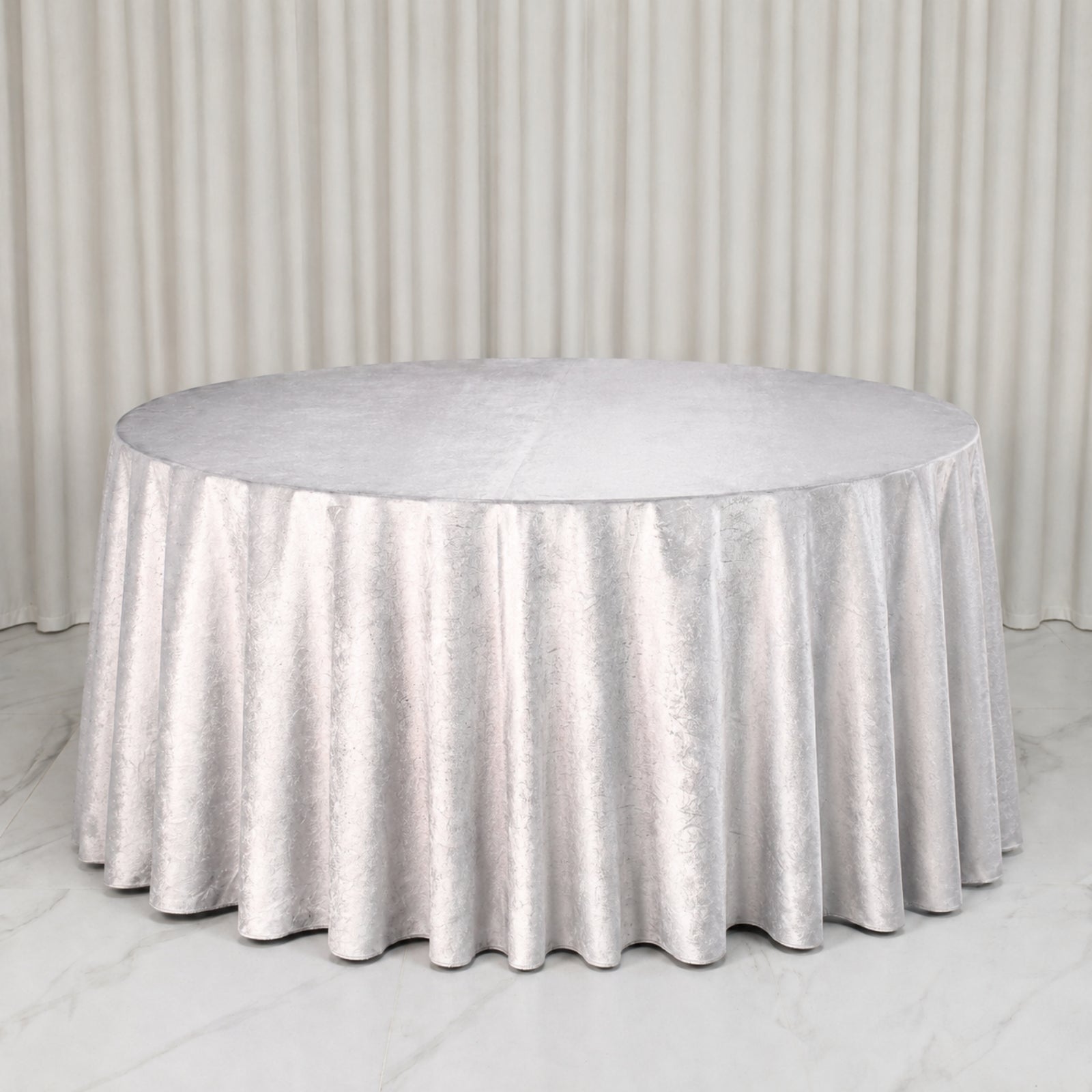 Premium silver velvet round tablecloth, soft and seamless, perfect for any occasion.