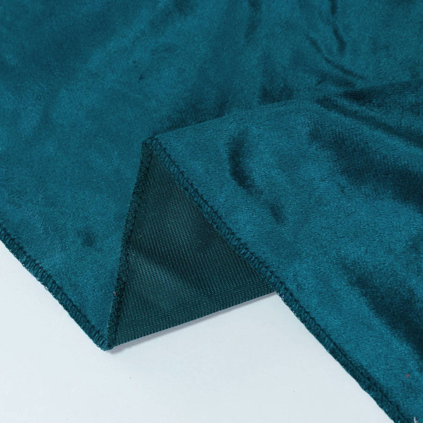 Premium velvet round tablecloth in peacock teal, soft and seamless design.