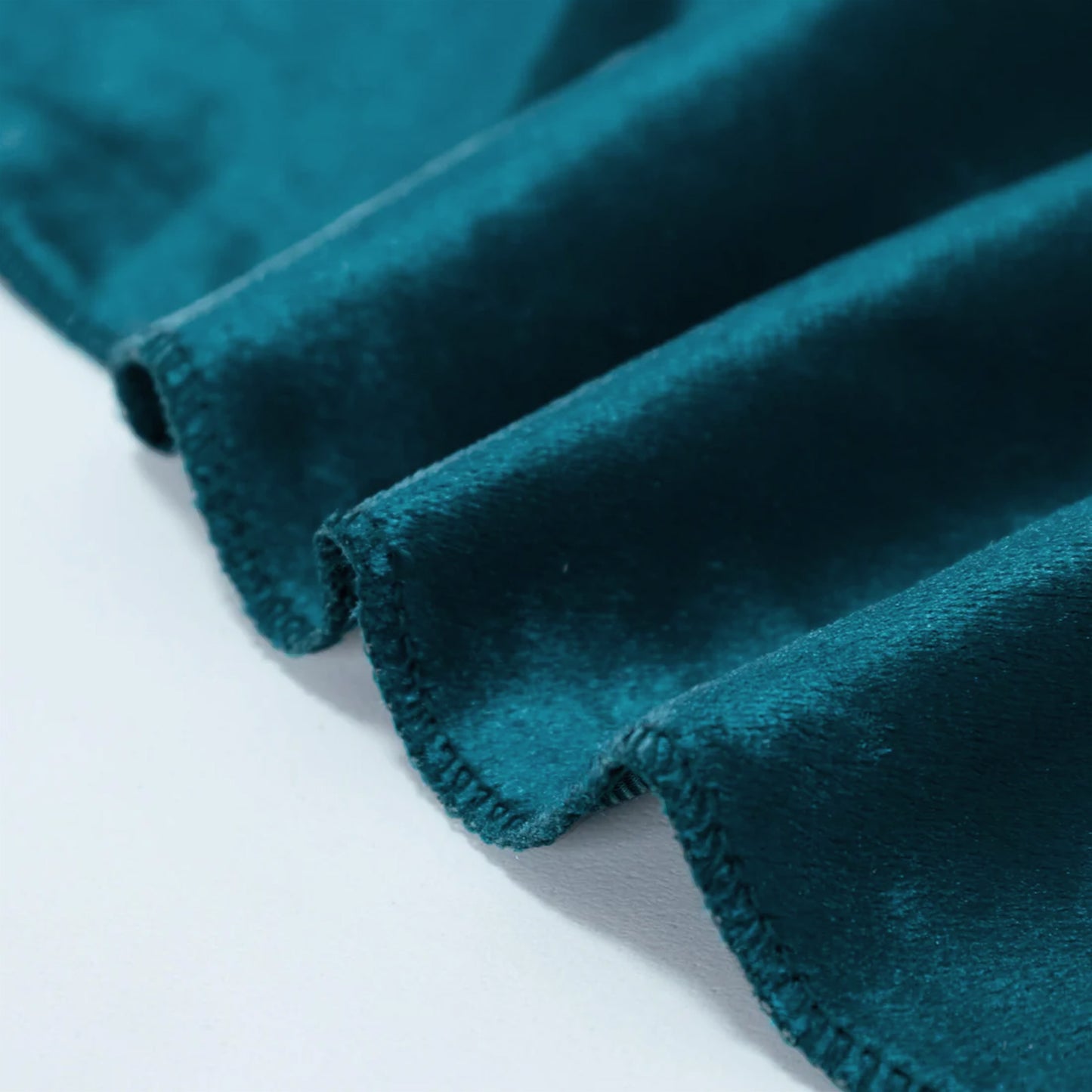 Peacock teal velvet round tablecloth with a soft, seamless finish.