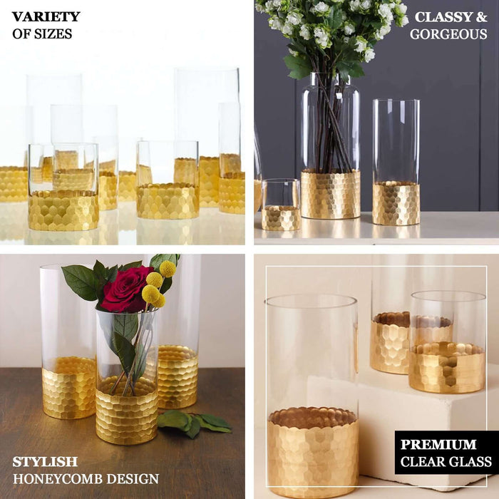 Clear glass vases with gold honeycomb bases in various sizes.